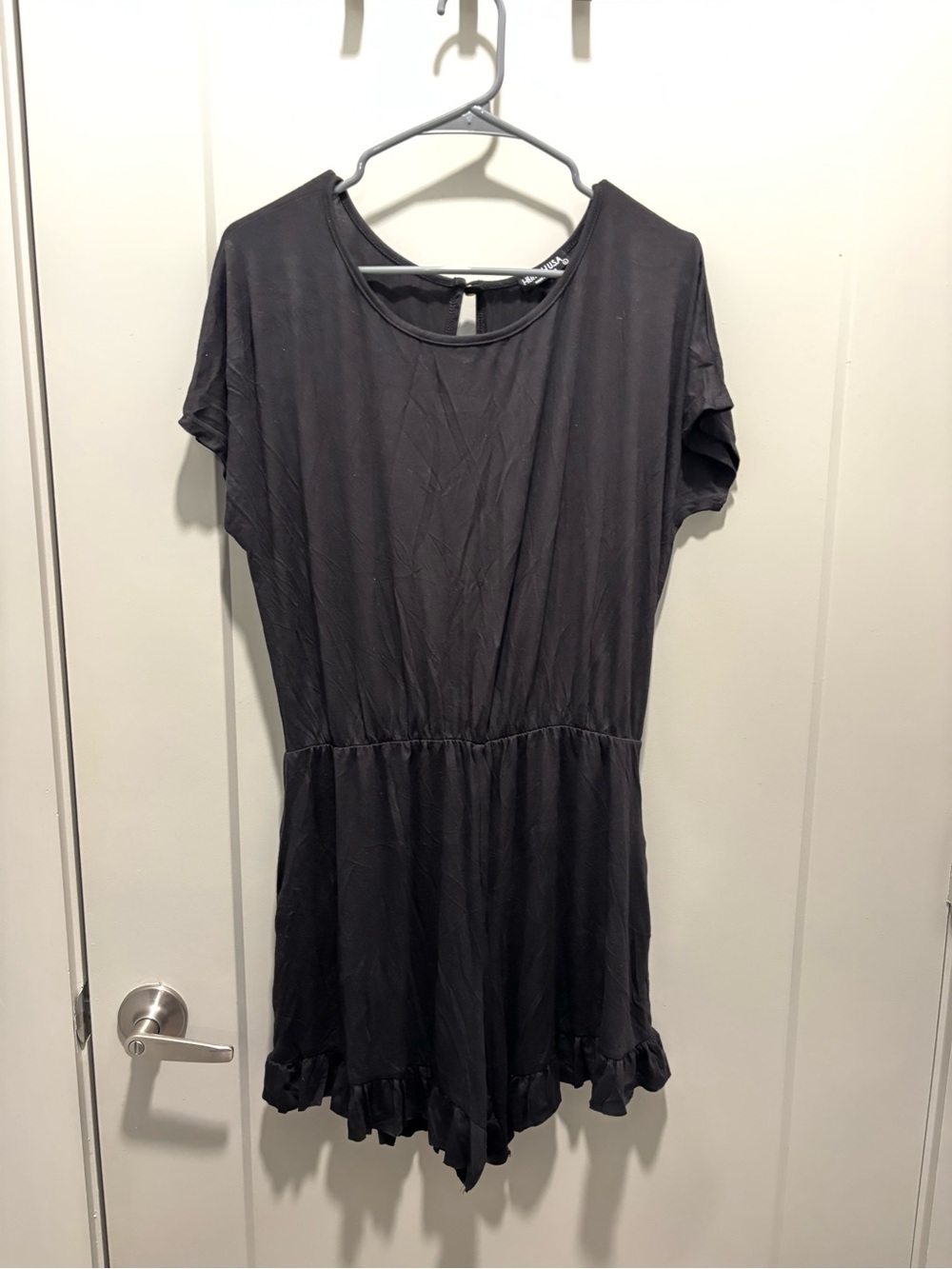 HEIMISH USA Black Short Sleeve Ruffle Hem Romper